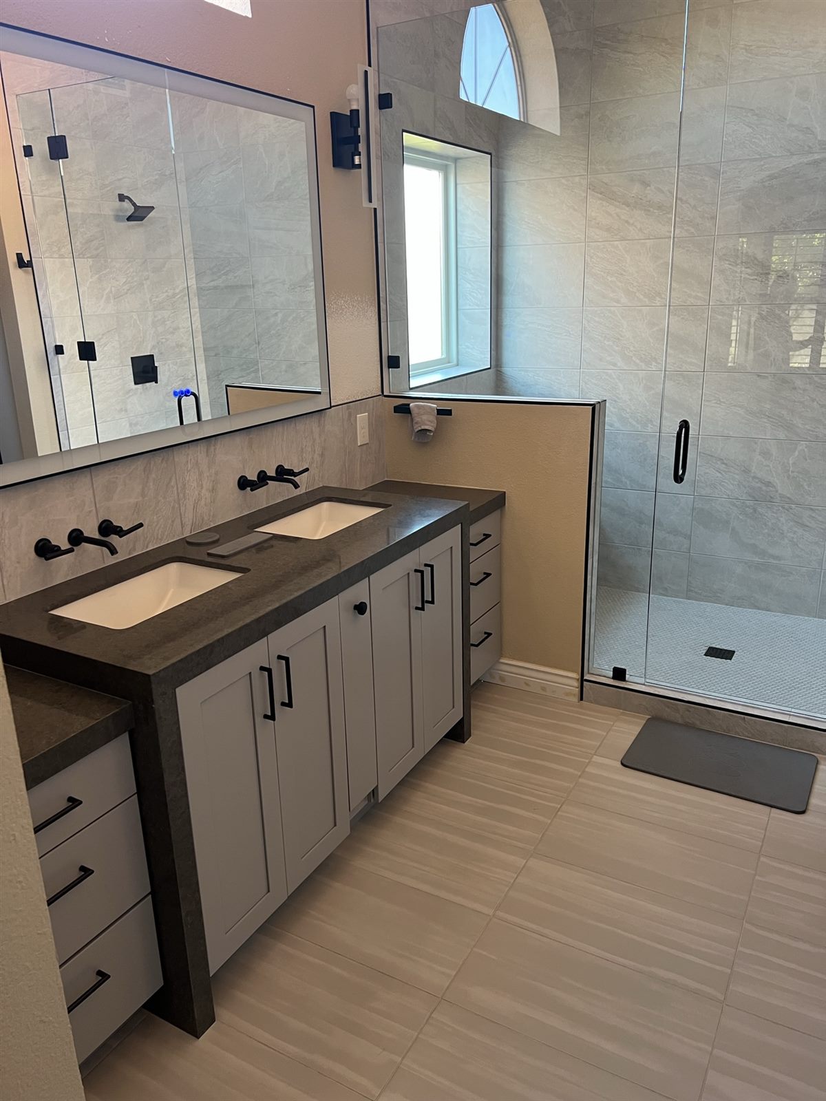 Completed bathroom remodel by Homeline Plumbing